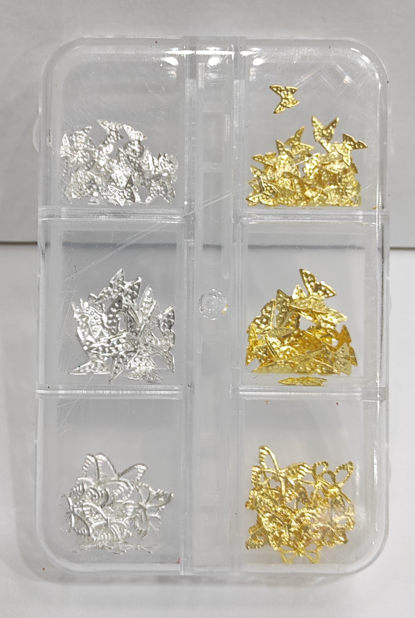 Decoração de unha - borboletinha dourado e prata